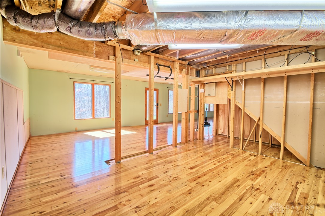 8711 Nicole Lane Springboro, OH 45066 - Photo 64 of 87 This versatile space offers an unfinished canvas with radiant hardwood flooring.