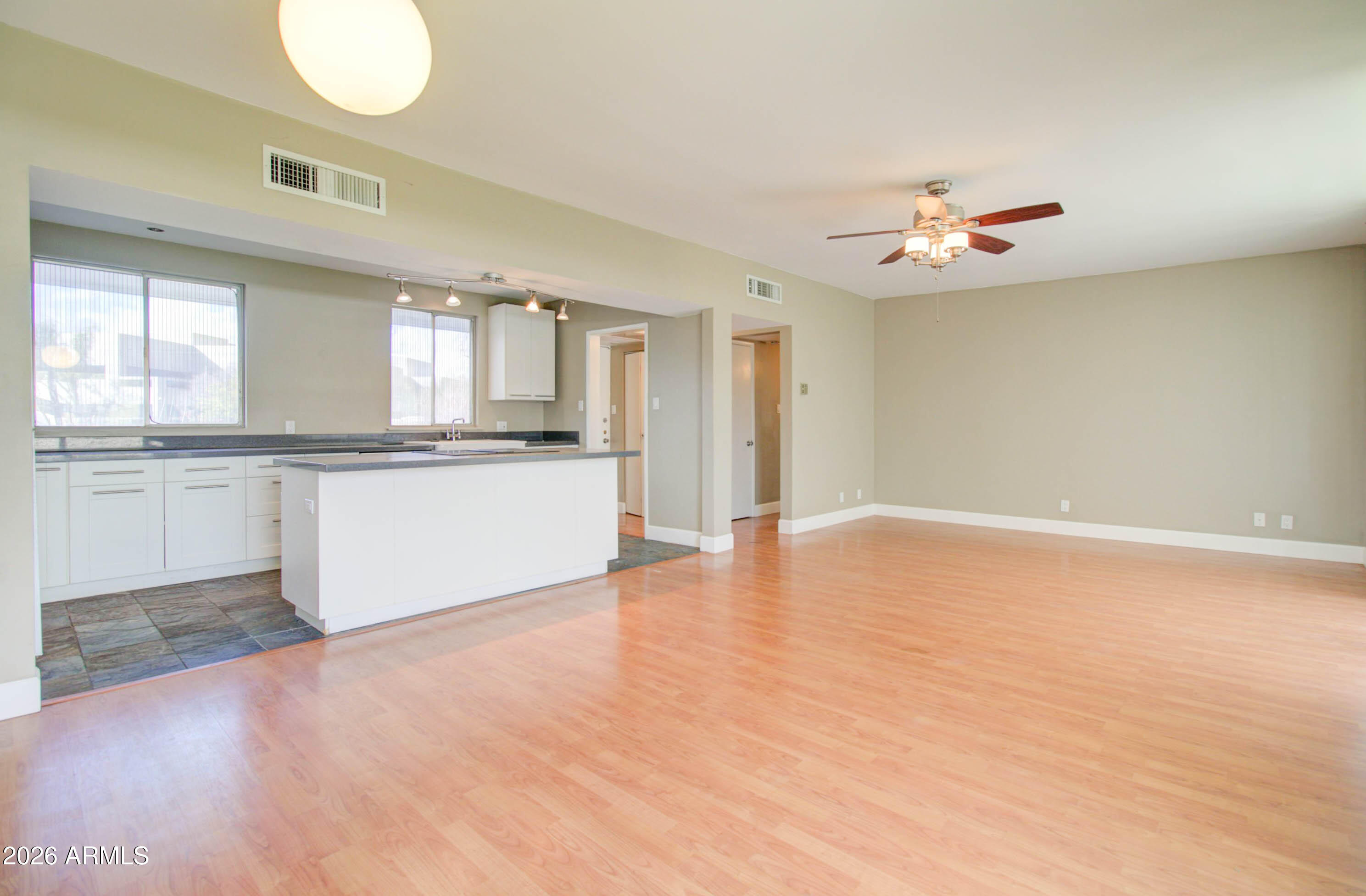 3242 East Camelback Road, Unit 207 Phoenix, AZ 85018 - Photo 12 of 25 Great Room w/ Balcony