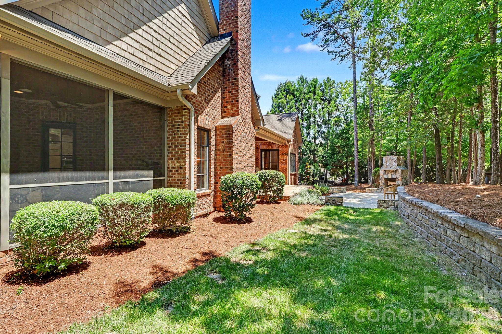 508 Hideaway Ridge Court Matthews, NC 28105 - Photo 41 of 47 a view of a house with backyard and a garden