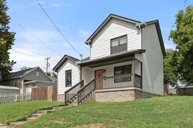 front view of house with a yard
