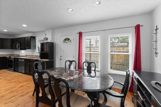 a view of a dining room with furniture