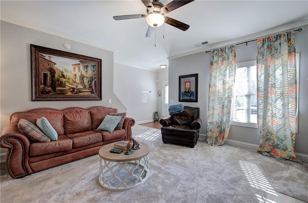 618 Manor Way Cartersville, GA 30120 - Photo 6 of 35 a living room with furniture and a large window