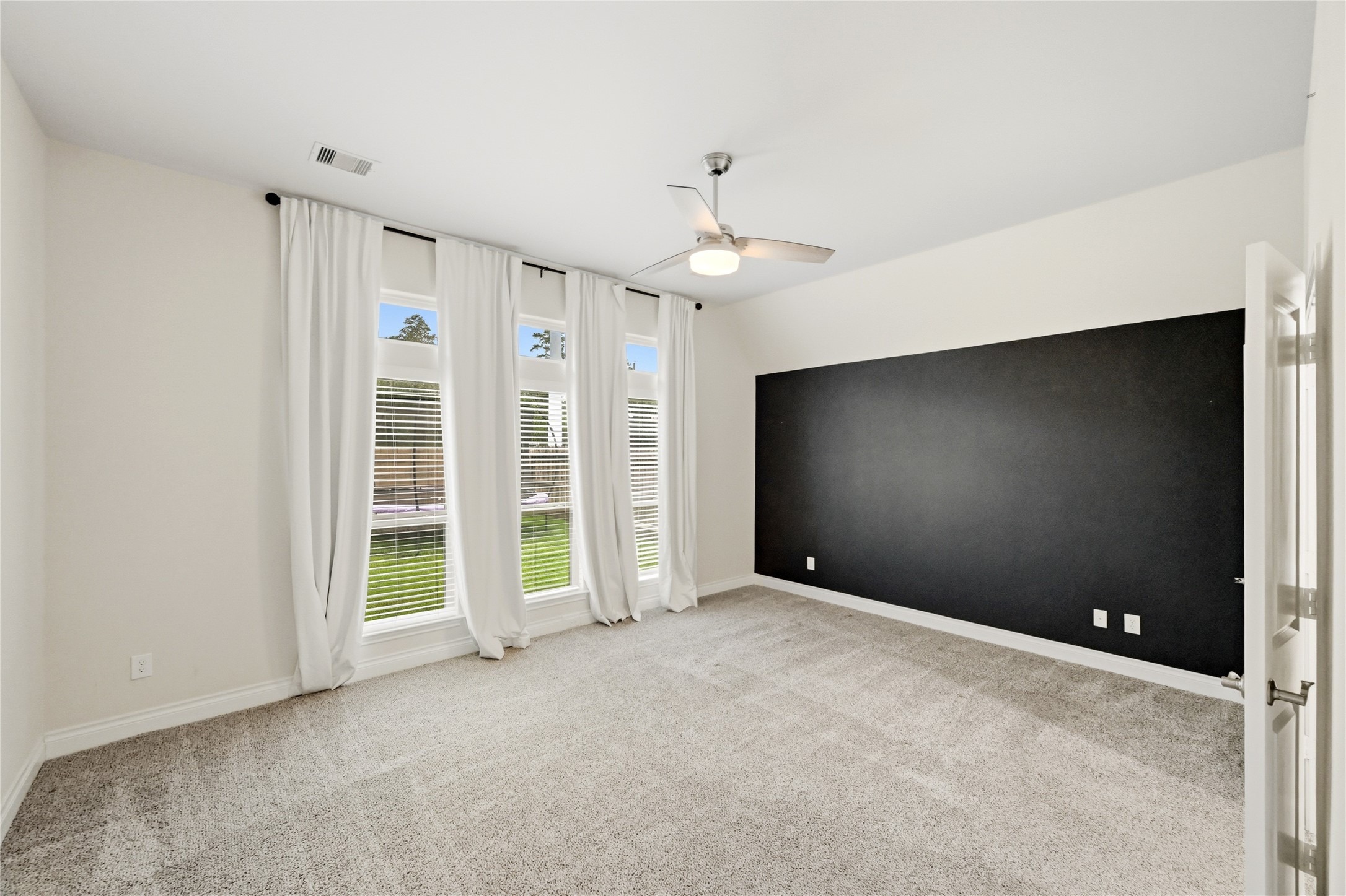 28329 Rabbitt Trail Spring, TX 77386 - Photo 17 of 36 Wall to floor windows.