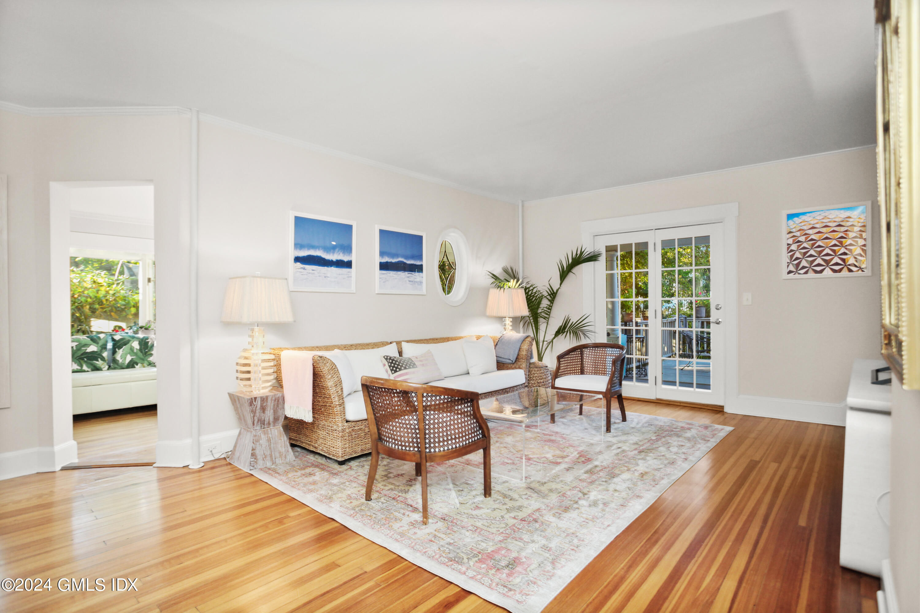 18 Shore Road Old Greenwich, CT 06870 - Photo 12 of 51 a living room with furniture and a window