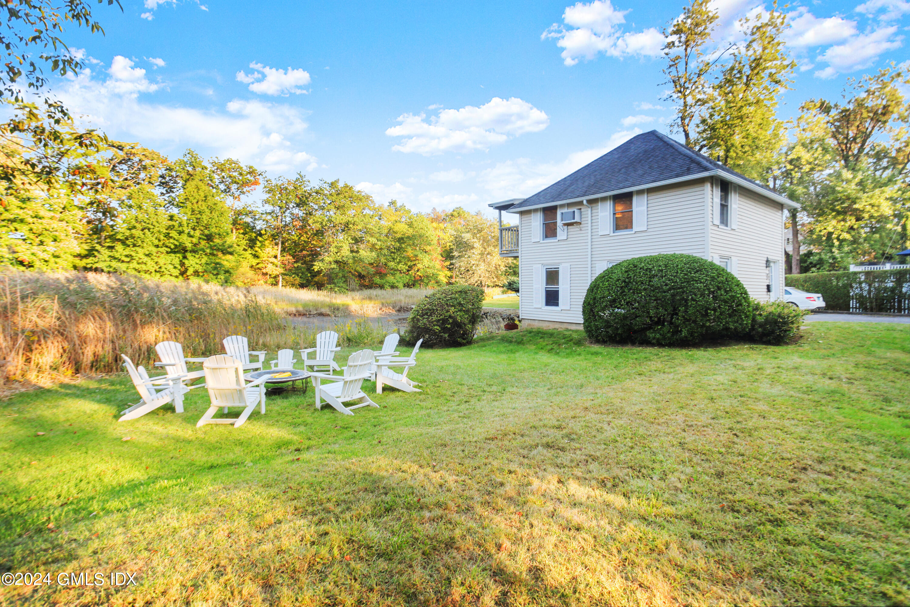 18 Shore Road Old Greenwich, CT 06870 - Photo 38 of 51 a view of a house with backyard and garden