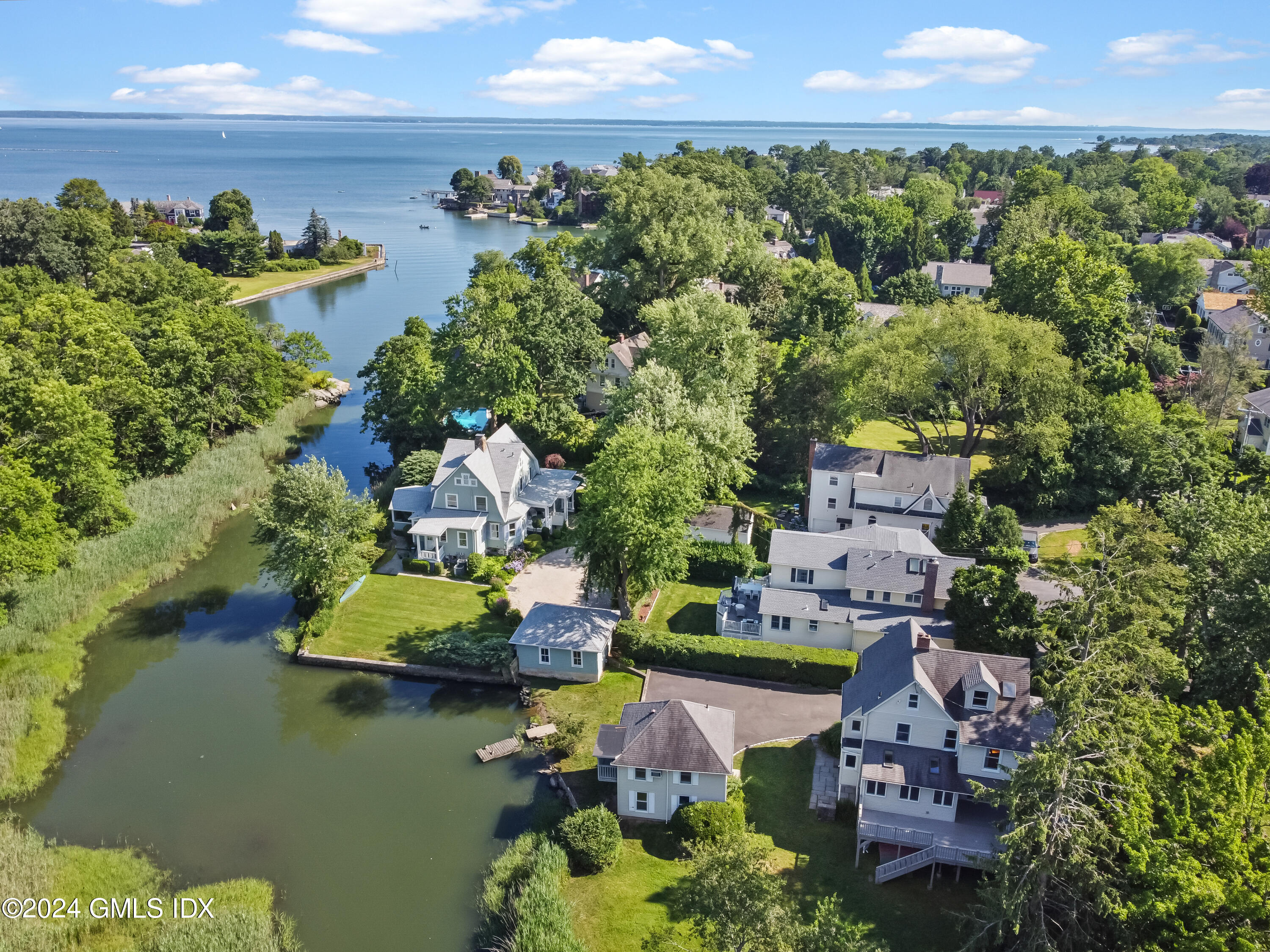 18 Shore Road Old Greenwich, CT 06870 - Photo 43 of 51 an aerial view of a house with a garden