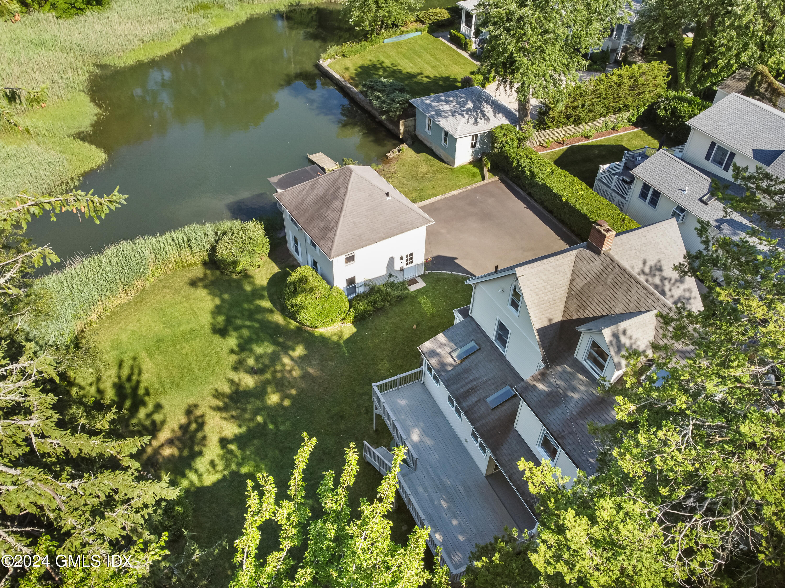 18 Shore Road Old Greenwich, CT 06870 - Photo 44 of 51 an aerial view of a house with a lake view