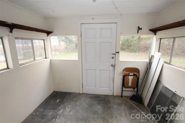 a kitchen with a sink and a refrigerator