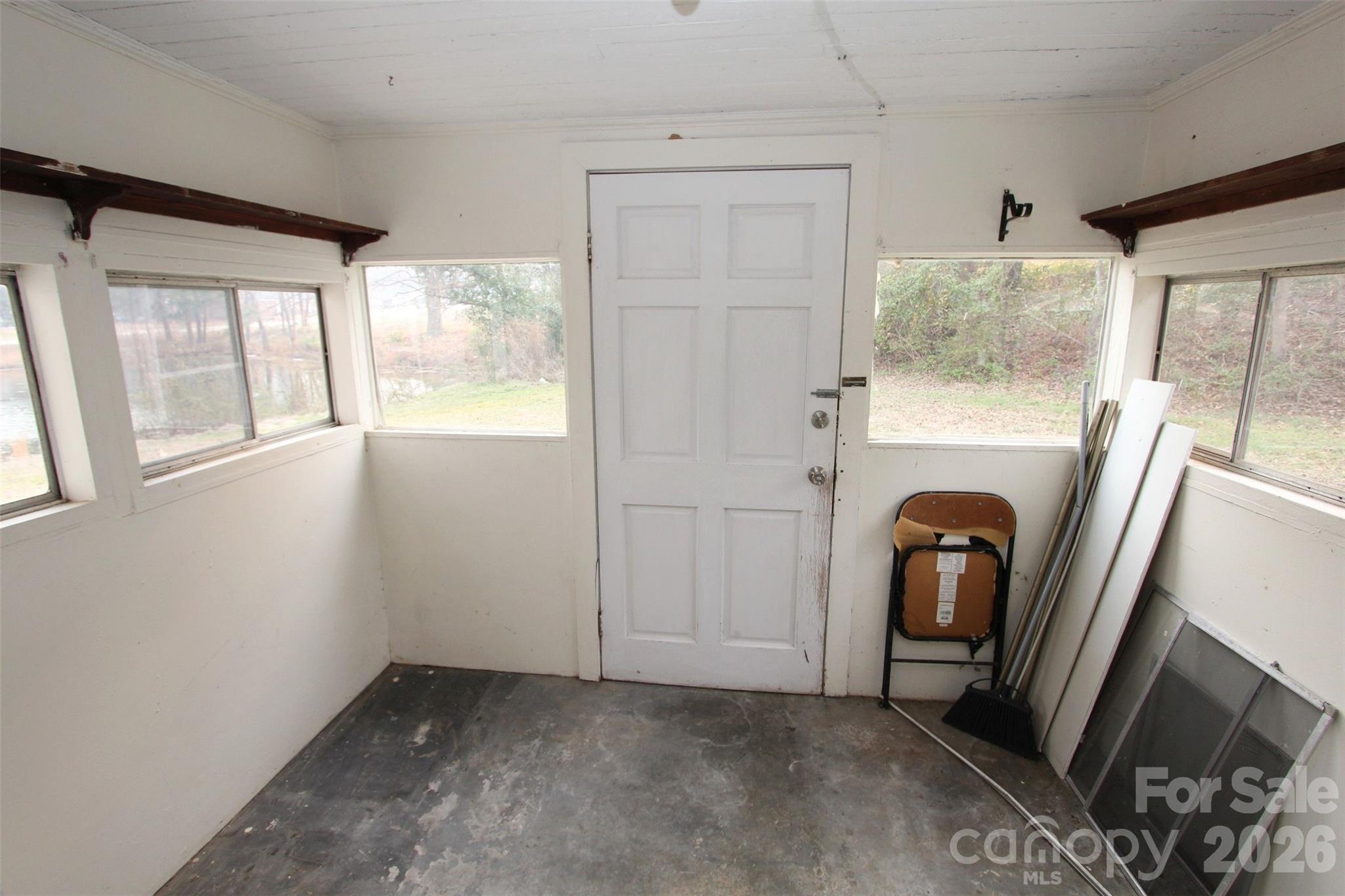 562 Us Highway South Rockingham, NC 28379 - Photo 11 of 42 a view of a storage and utility room with furniture and a window