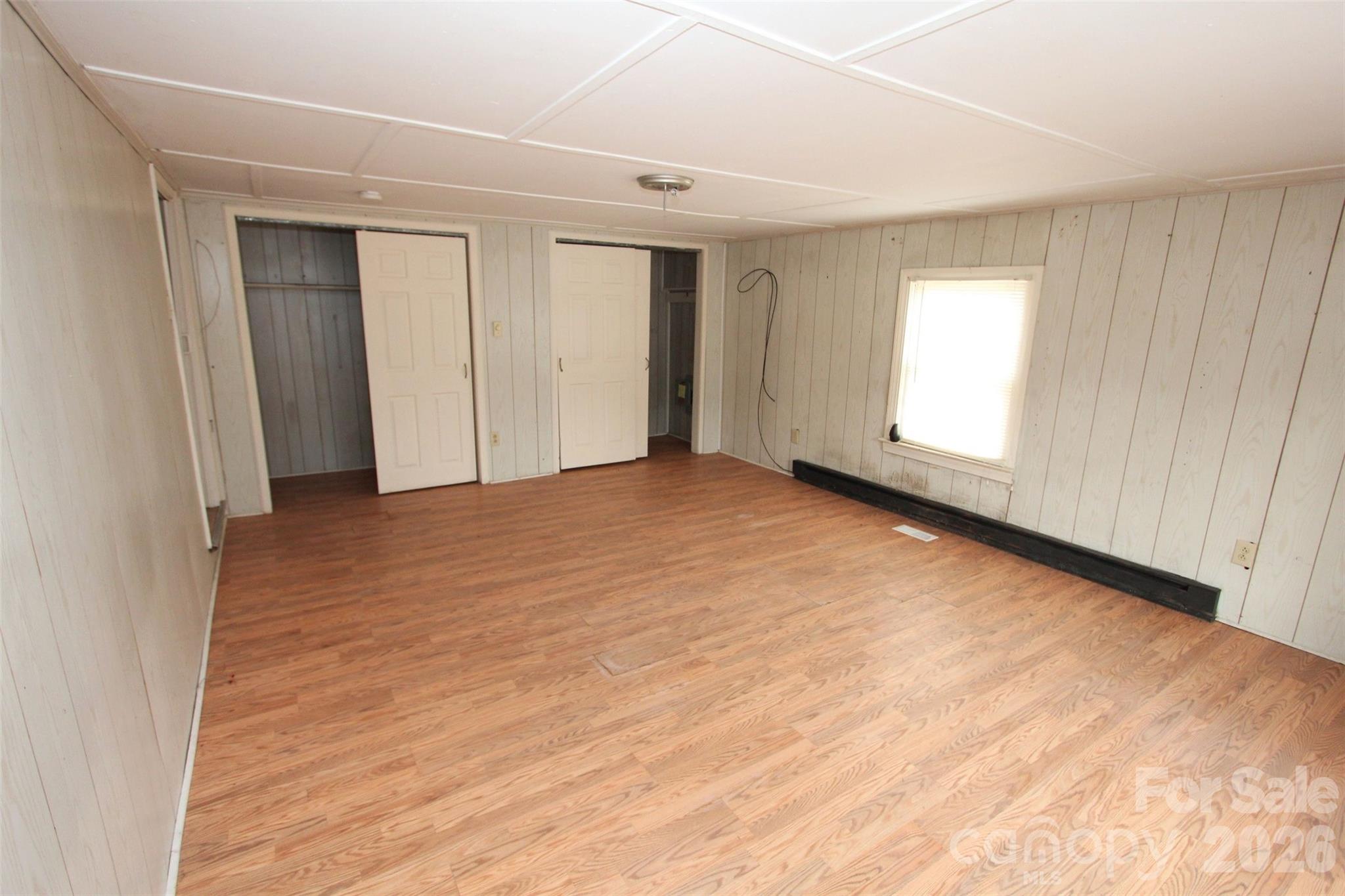562 Us Highway South Rockingham, NC 28379 - Photo 27 of 42 a view of an empty room with wooden floor