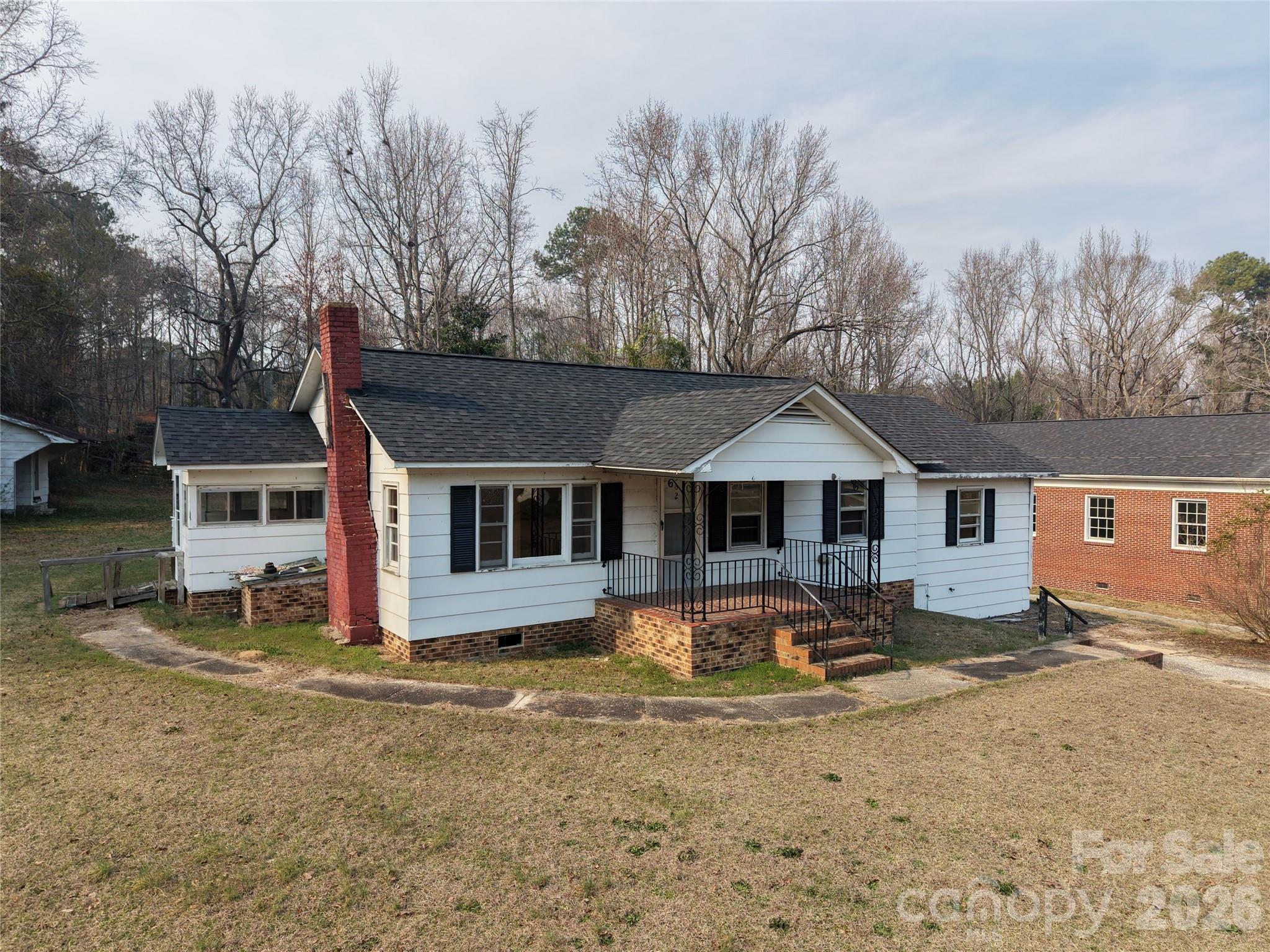 562 Us Highway South Rockingham, NC 28379 - Photo 28 of 42 a front view of a house with a yard