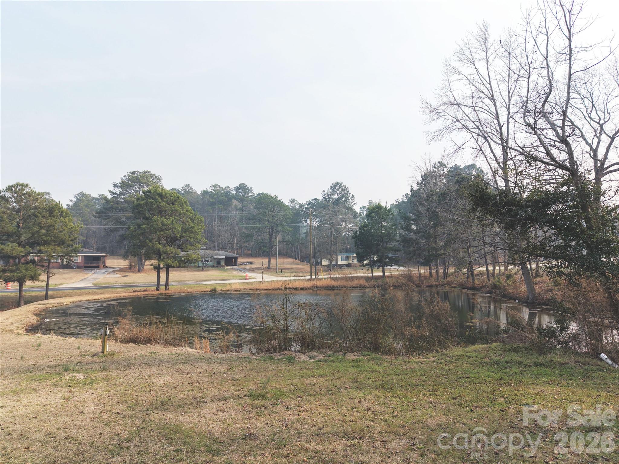 562 Us Highway South Rockingham, NC 28379 - Photo 29 of 42 a view of a lake view with houses in the back
