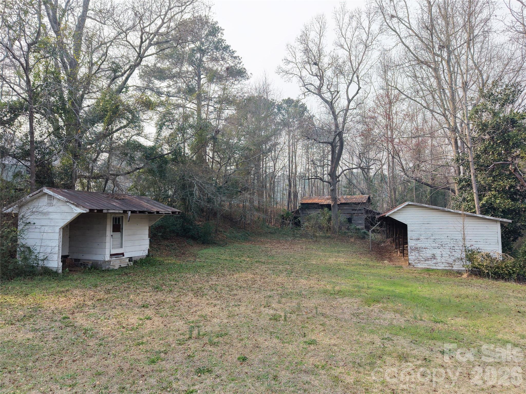 562 Us Highway South Rockingham, NC 28379 - Photo 33 of 42 a view of a house with backyard and tree