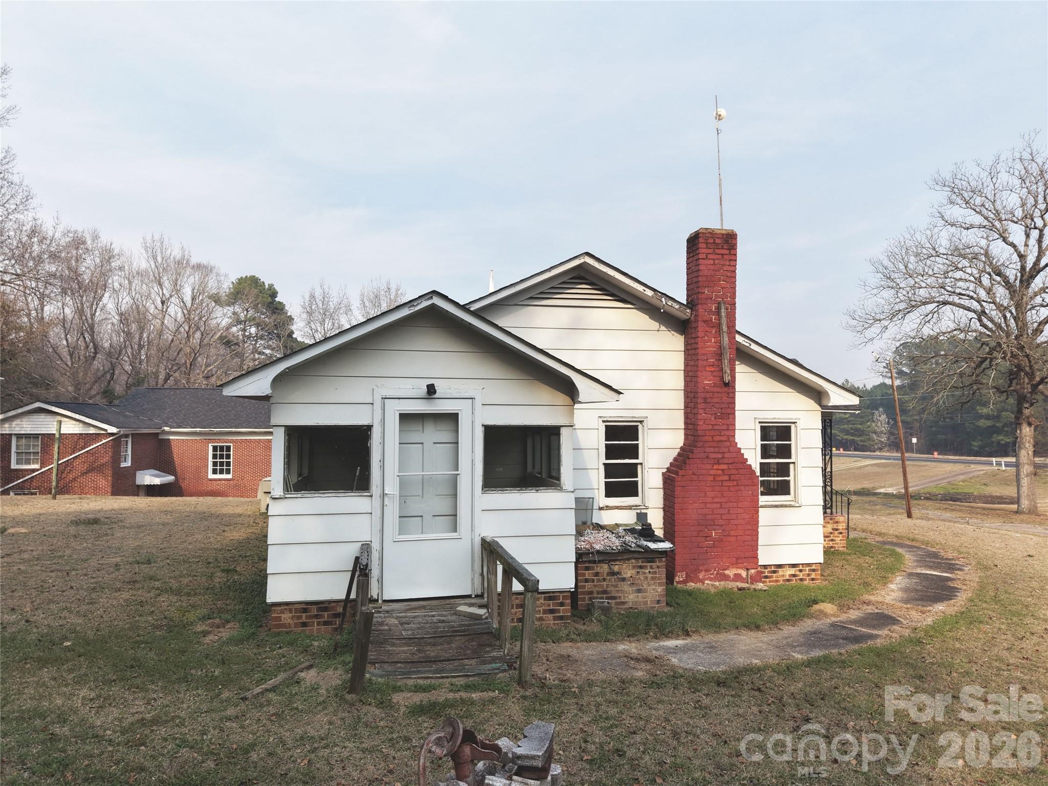 562 Us Highway South Rockingham, NC 28379 - Photo 4 of 42 a front view of a house with a yard