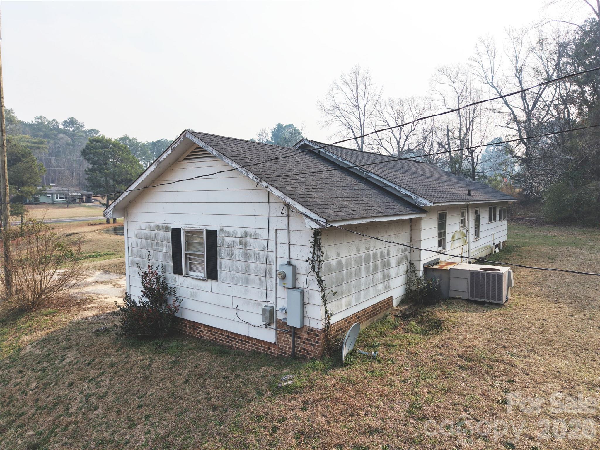 562 Us Highway South Rockingham, NC 28379 - Photo 7 of 42 a view of a house with a yard