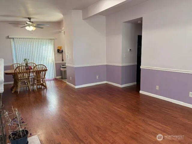 a view of livingroom with furniture wooden floor and window