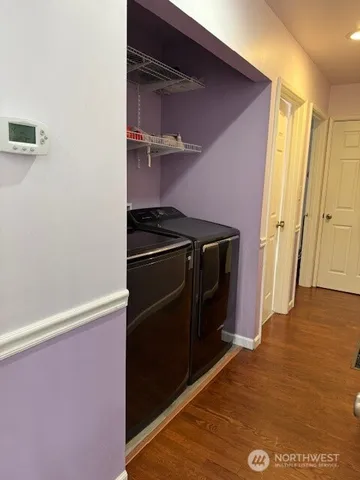 a room with furniture and a flat screen tv