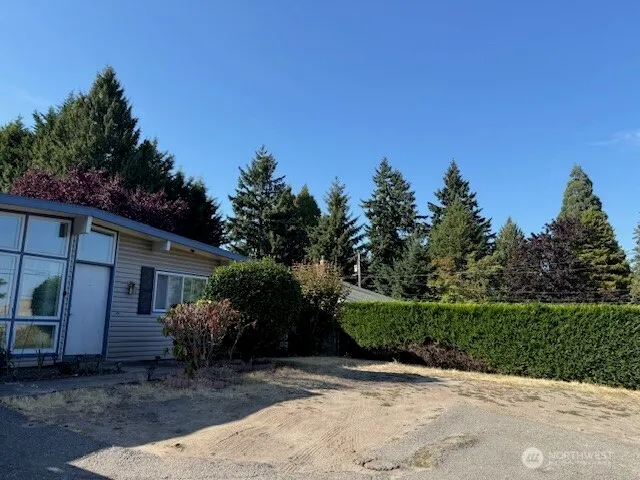 a view of backyard with green space