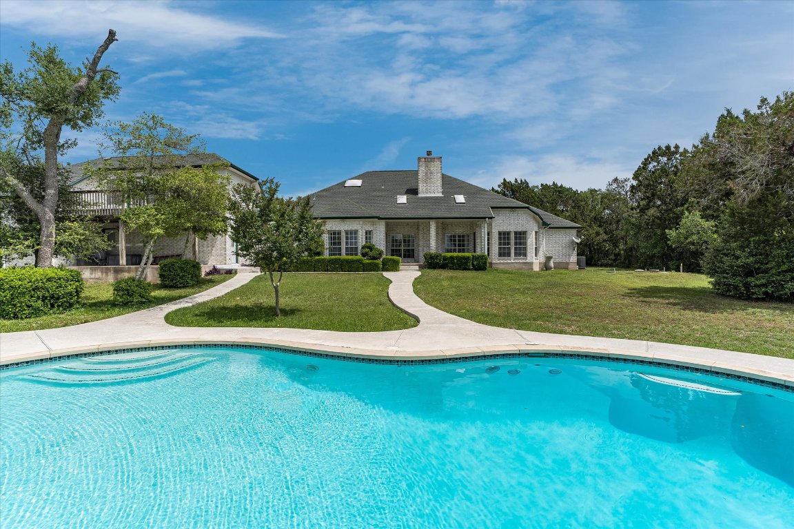 a view of a house with a swimming pool