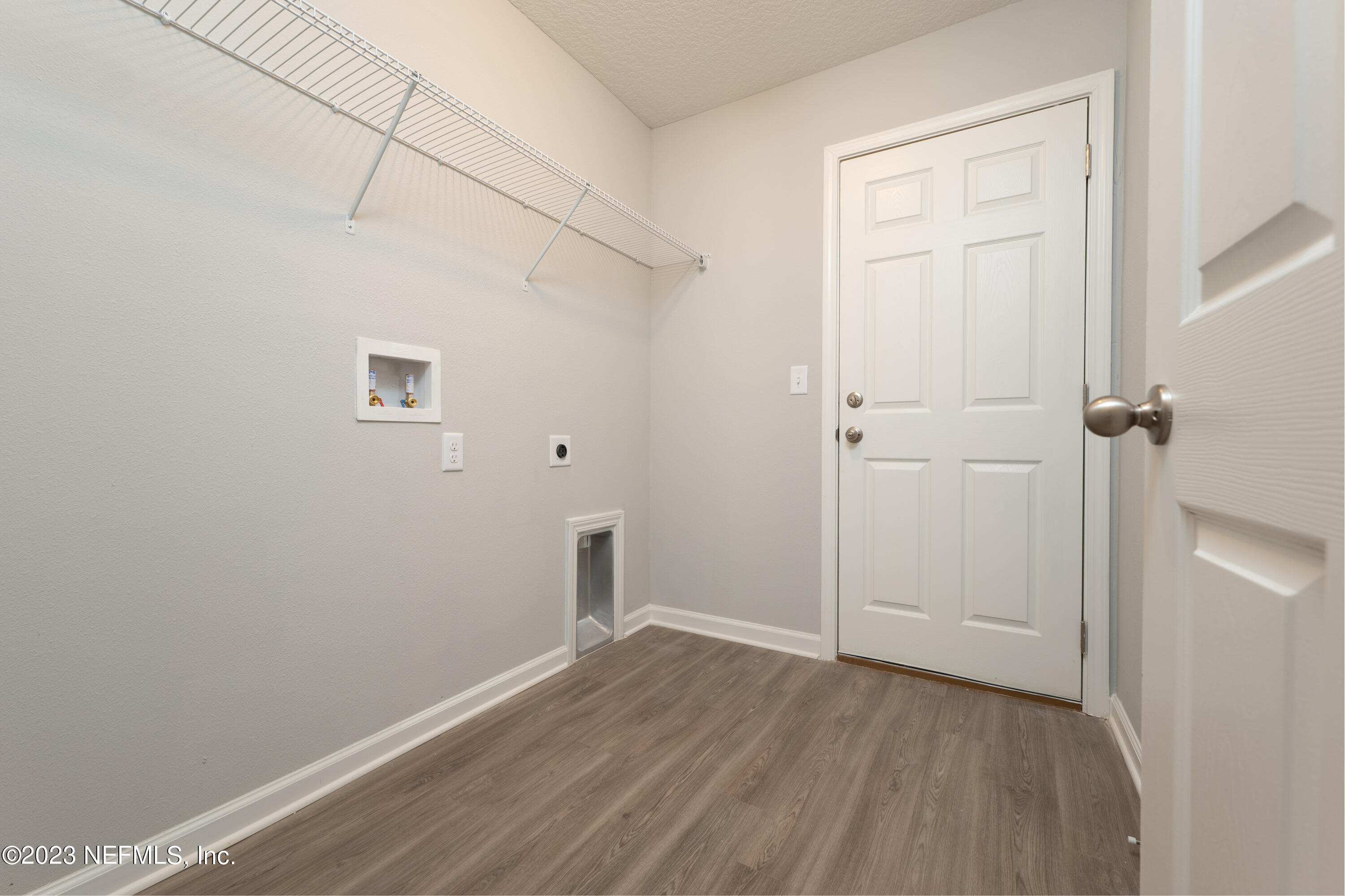 12701 Dunn Creek Road Jacksonville, FL 32226 - Photo 23 of 51 a view of a room with wooden floor