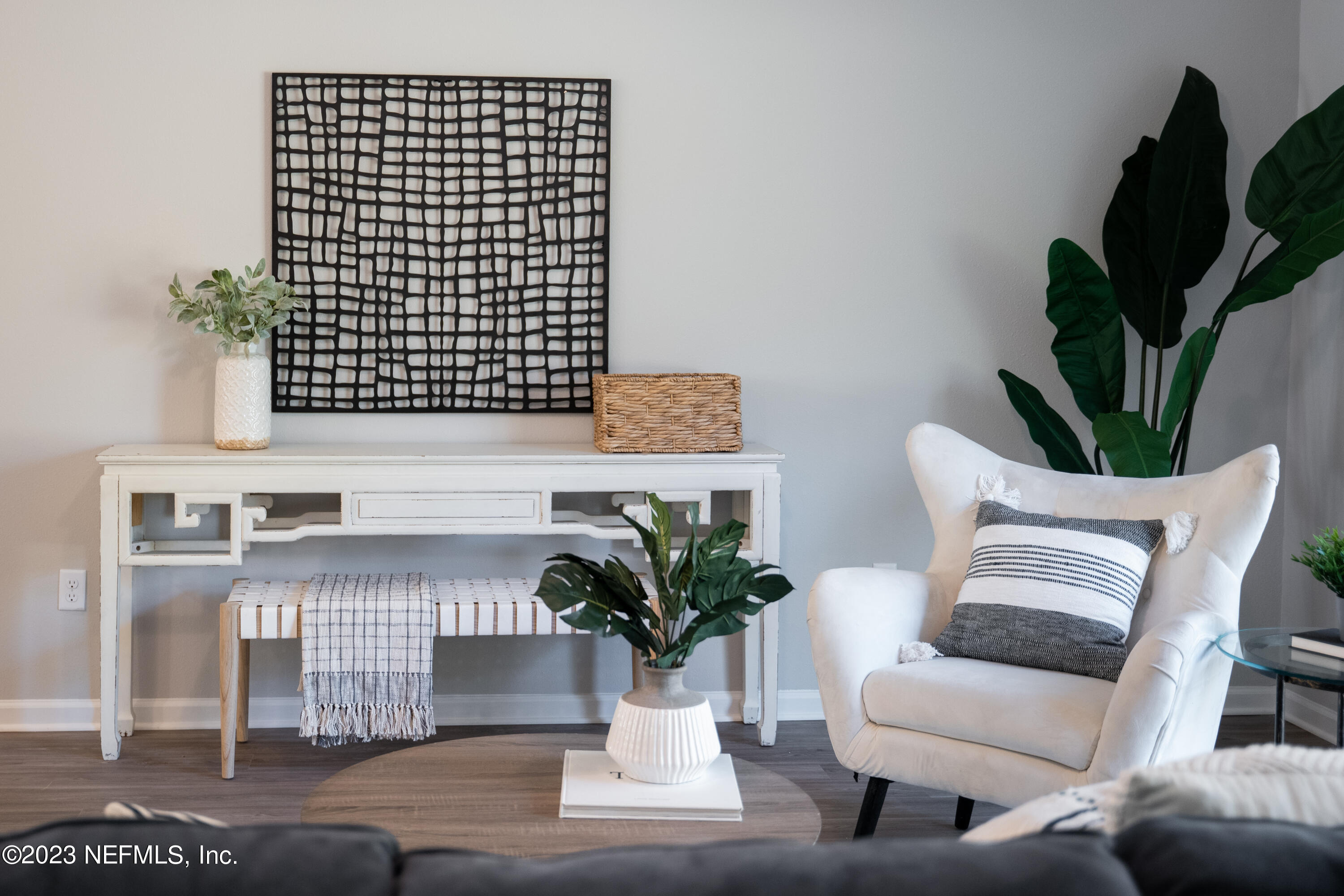 12701 Dunn Creek Road Jacksonville, FL 32226 - Photo 34 of 51 a view of living room with furniture and a potted plant
