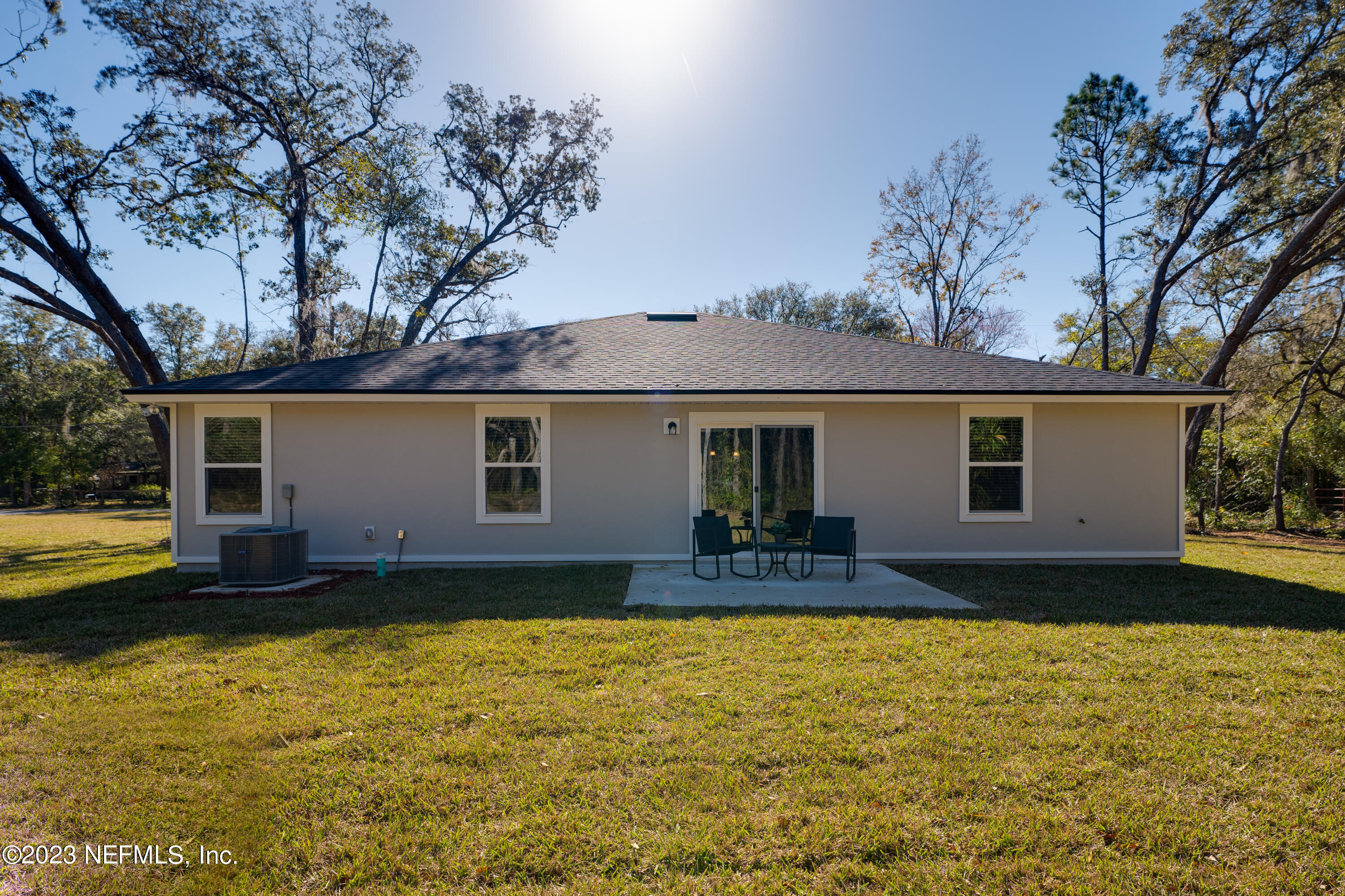 12701 Dunn Creek Road Jacksonville, FL 32226 - Photo 4 of 51 a view of a house with pool and sitting area