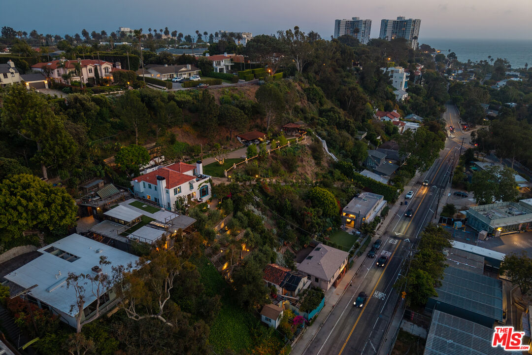 454 Stassi Lane Santa Monica, CA 90402 - Photo 33 of 33 an aerial view of a house with a yard and lake view
