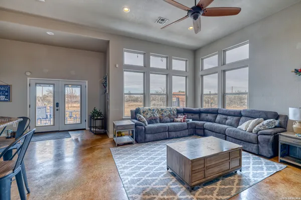 a view of living room filled with furniture