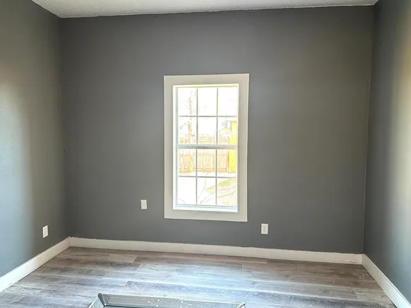 a view of a room that has a window