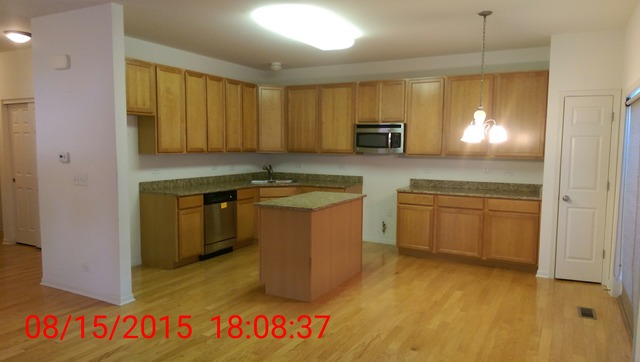 3948 Pratt Street Plano, IL 60545 - Photo 2 of 19 a kitchen with stainless steel appliances granite countertop a sink a stove and a refrigerator