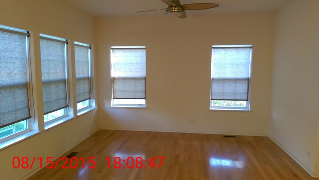 3948 Pratt Street Plano, IL 60545 - Photo 3 of 19 a view of an empty room and window