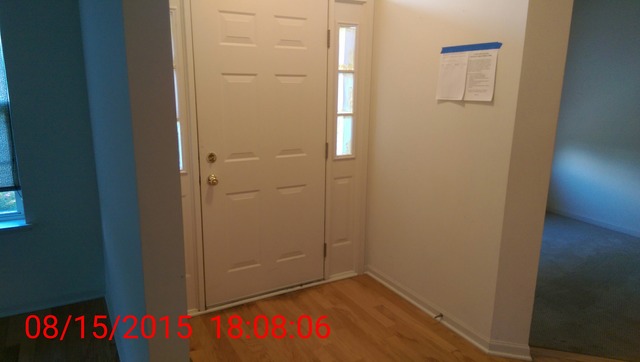 3948 Pratt Street Plano, IL 60545 - Photo 5 of 19 a view of a hallway with wooden floor