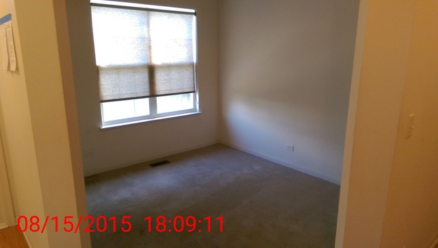 3948 Pratt Street Plano, IL 60545 - Photo 6 of 19 a view of an empty room and window