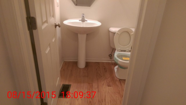 3948 Pratt Street Plano, IL 60545 - Photo 7 of 19 a bathroom with a sink