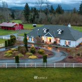 an aerial view of a house with a garden
