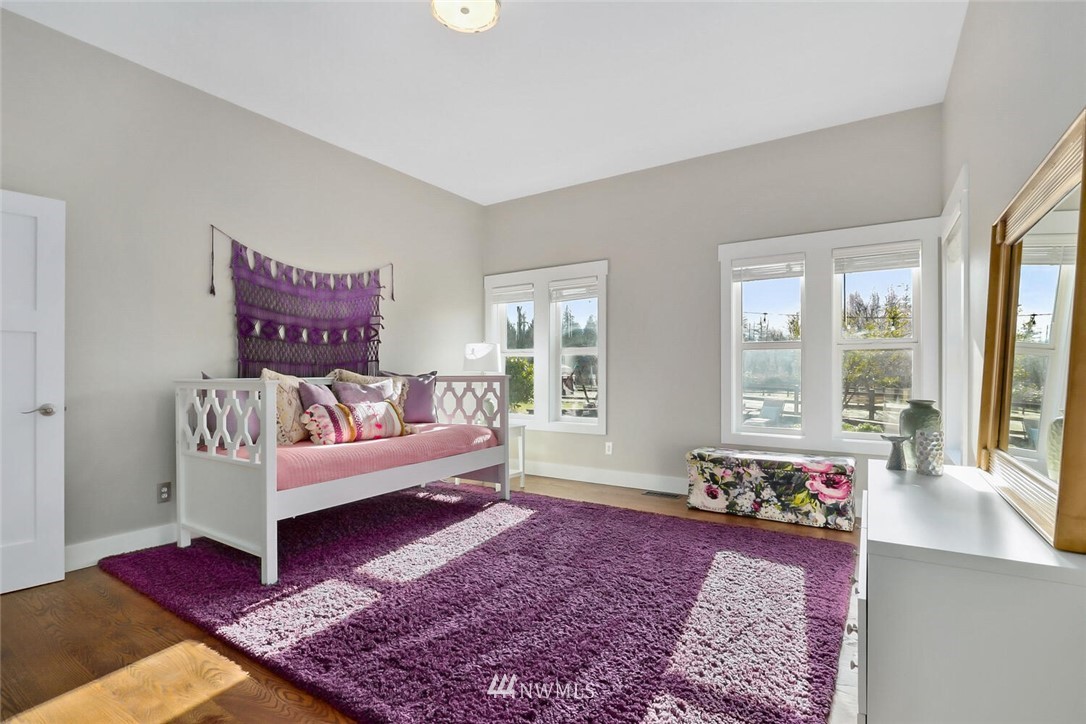4458 Preston-Fall City Road Southeast Fall City, WA 98024 - Photo 23 of 40 a living room with furniture and a rug