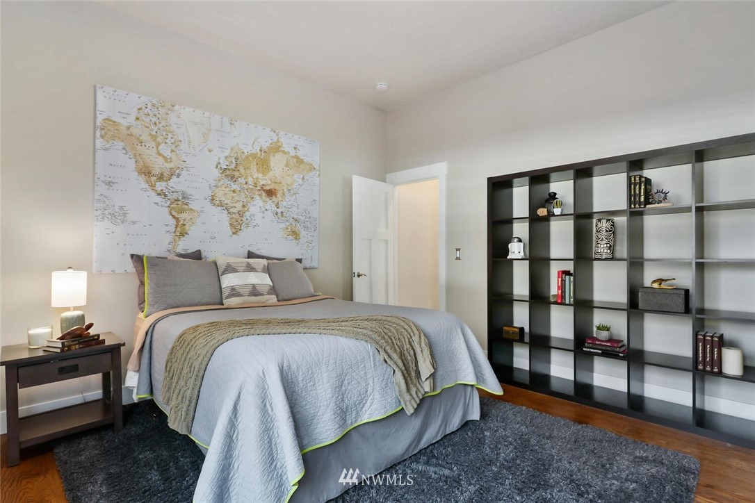 4458 Preston-Fall City Road Southeast Fall City, WA 98024 - Photo 24 of 40 a spacious bedroom with a bed and a window