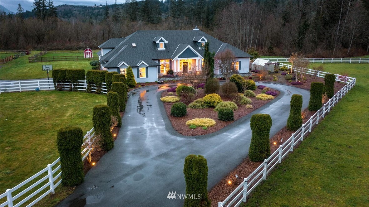 4458 Preston-Fall City Road Southeast Fall City, WA 98024 - Photo 38 of 40 an aerial view of a house with swimming pool patio and outdoor seating