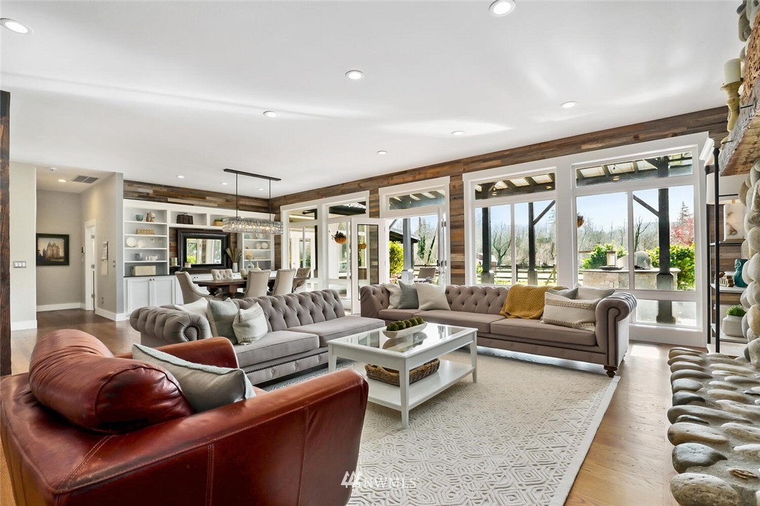 4458 Preston-Fall City Road Southeast Fall City, WA 98024 - Photo 6 of 40 a living room with furniture and a large window