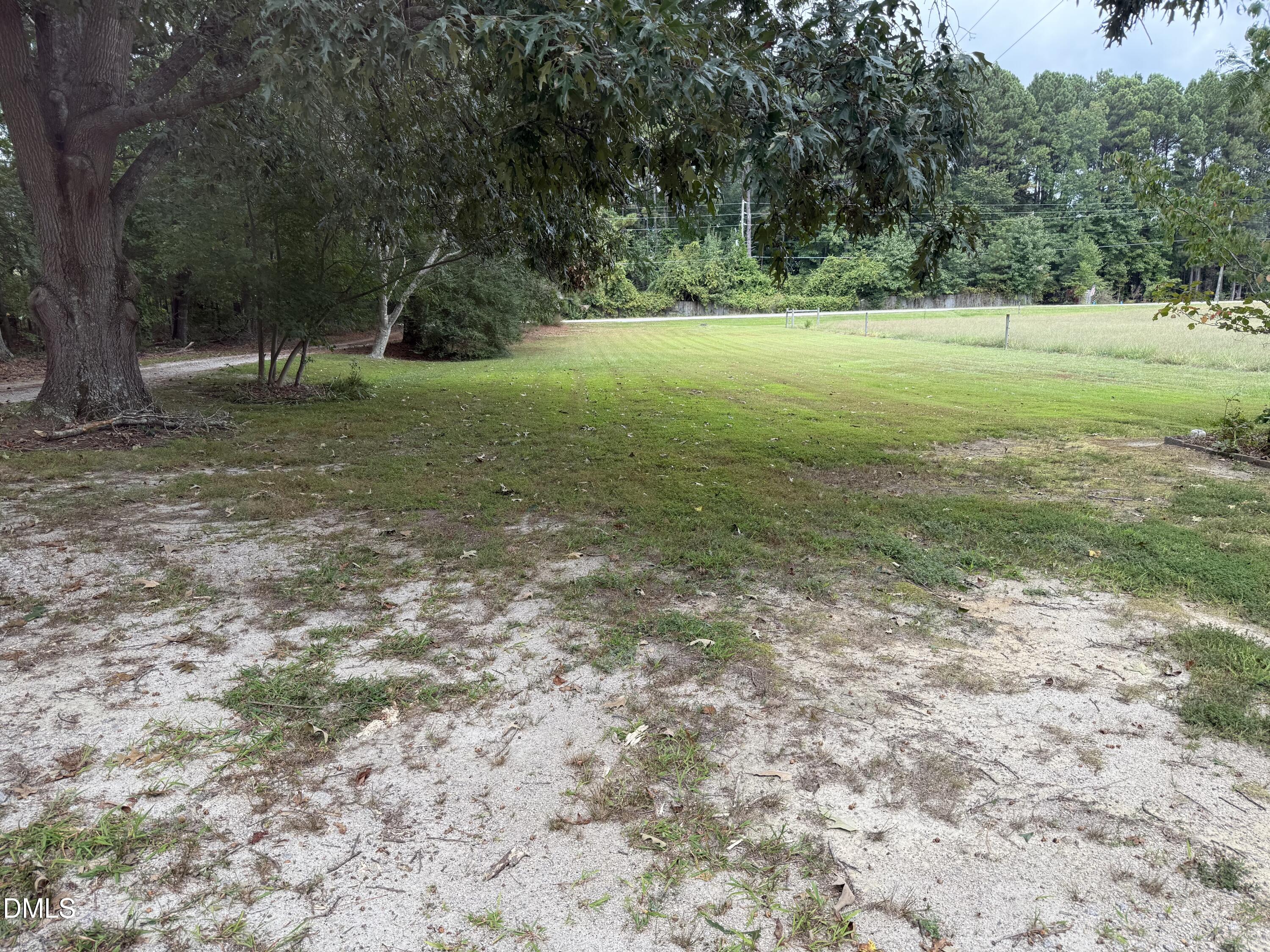2005 Flat Rock Church Road Youngsville, NC 27596 - Photo 19 of 21 a view of outdoor space with trees all around