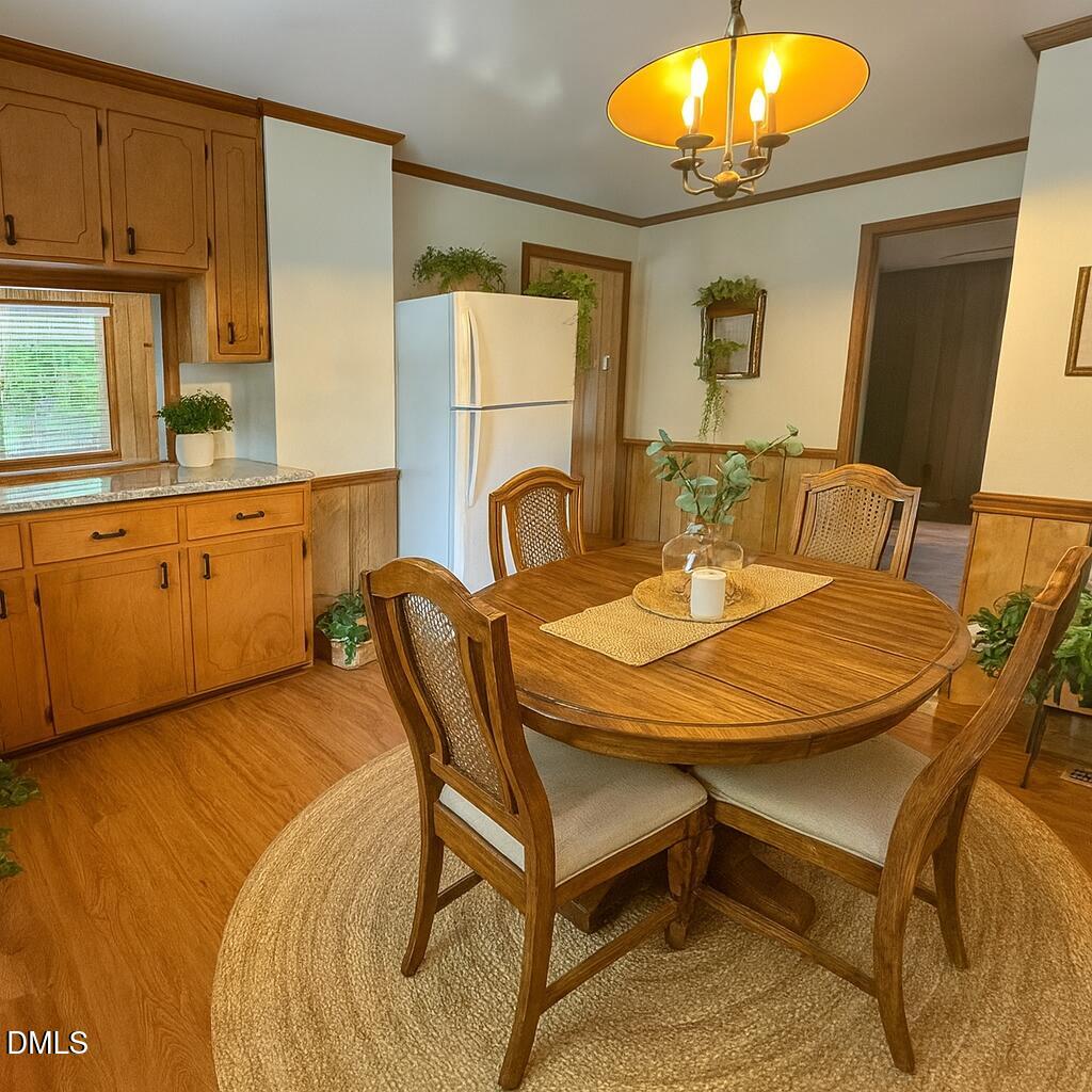2005 Flat Rock Church Road Youngsville, NC 27596 - Photo 6 of 21 a bed room with a bed and furniture