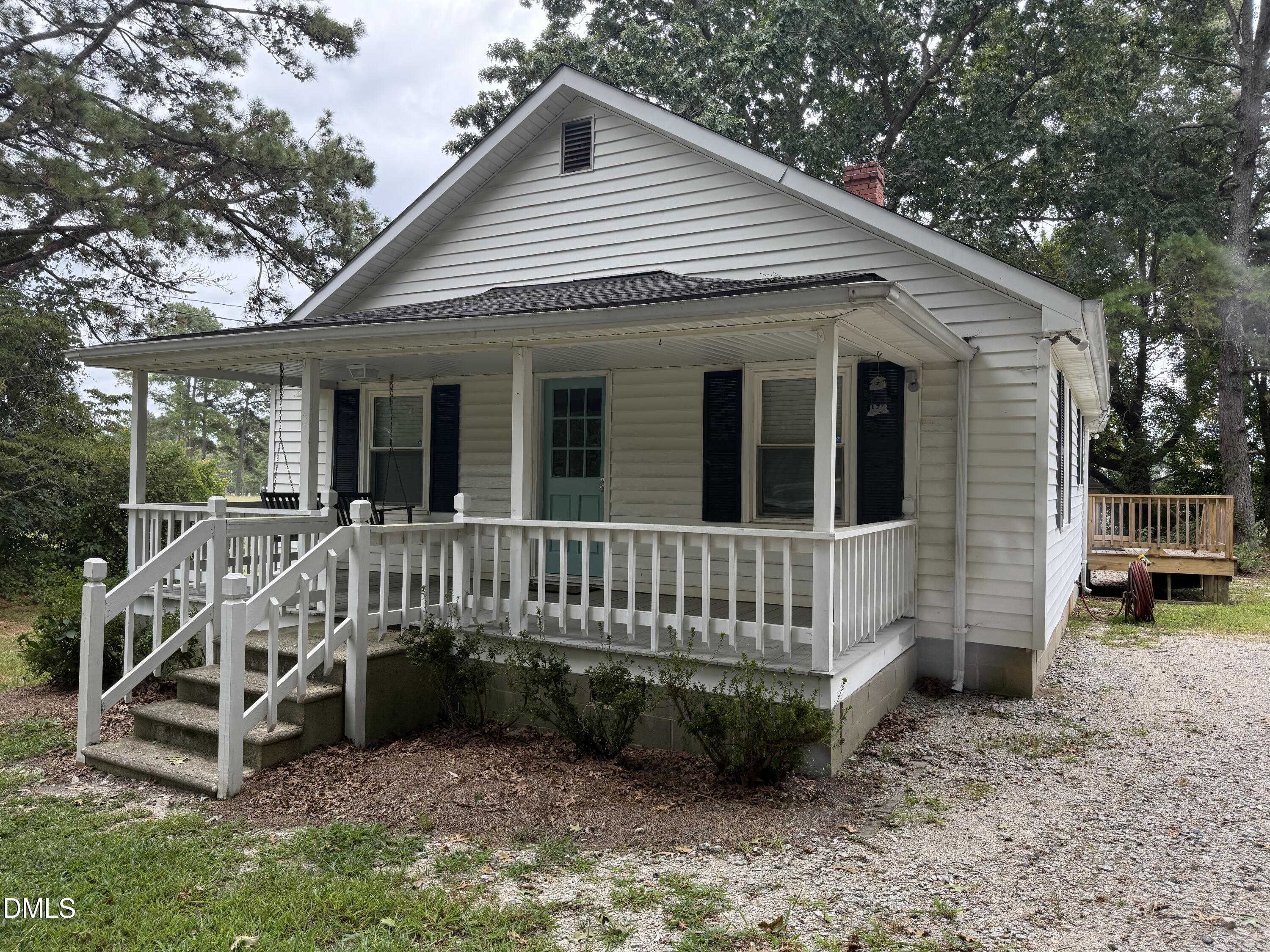 2005 Flat Rock Church Road Youngsville, NC 27596 - Photo 7 of 21 a view of a house with a yard and deck