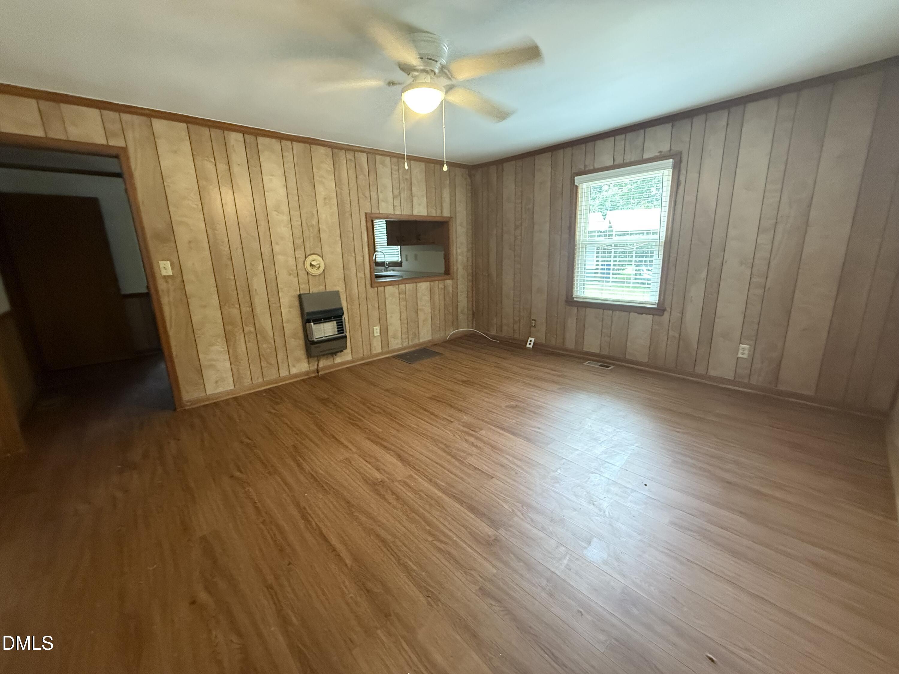 2005 Flat Rock Church Road Youngsville, NC 27596 - Photo 10 of 21 wooden floor in an empty room with a window