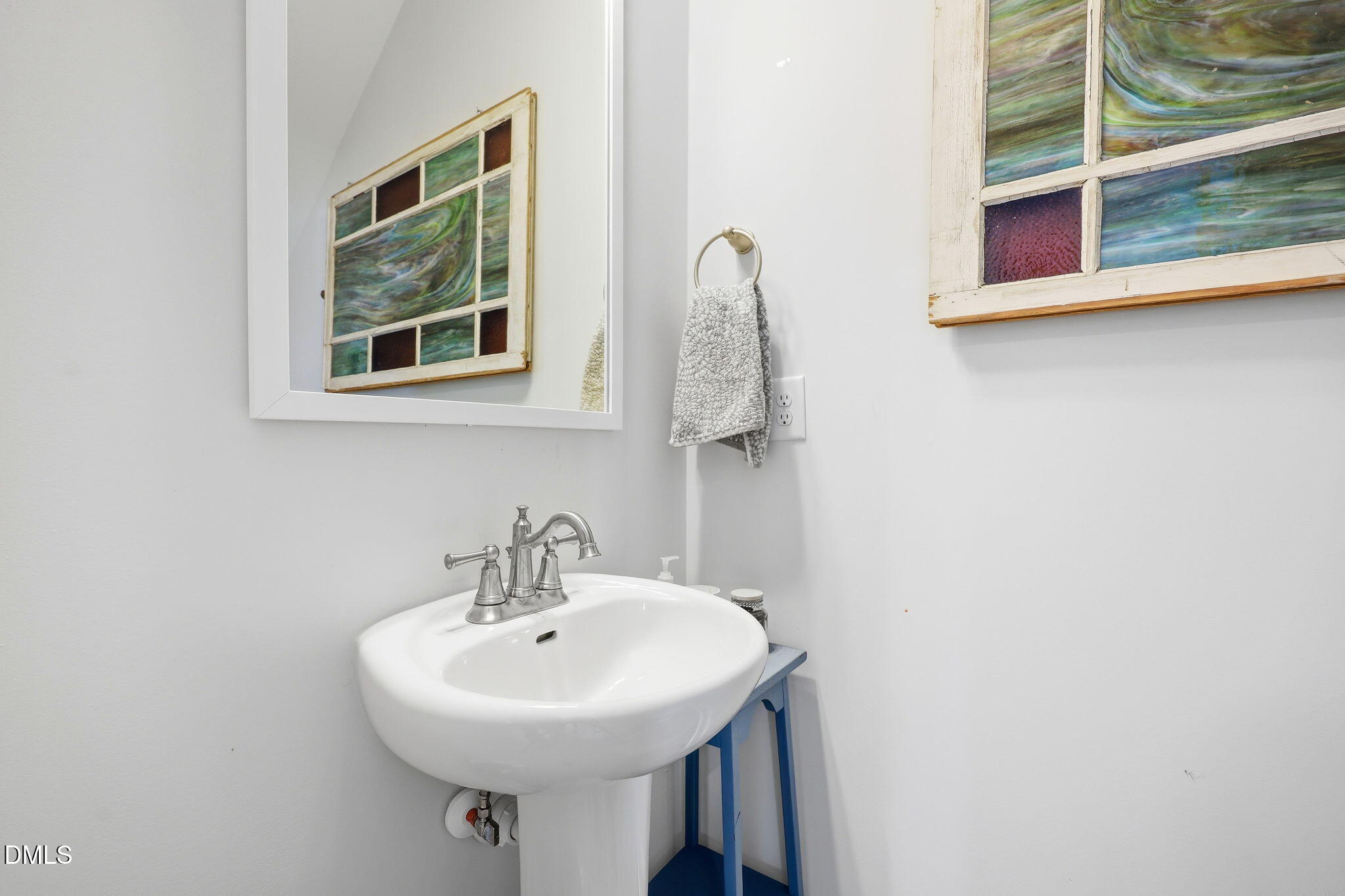 104 Kavanaugh Road Wake Forest, NC 27587 - Photo 16 of 36 a bathroom with a sink and a mirror