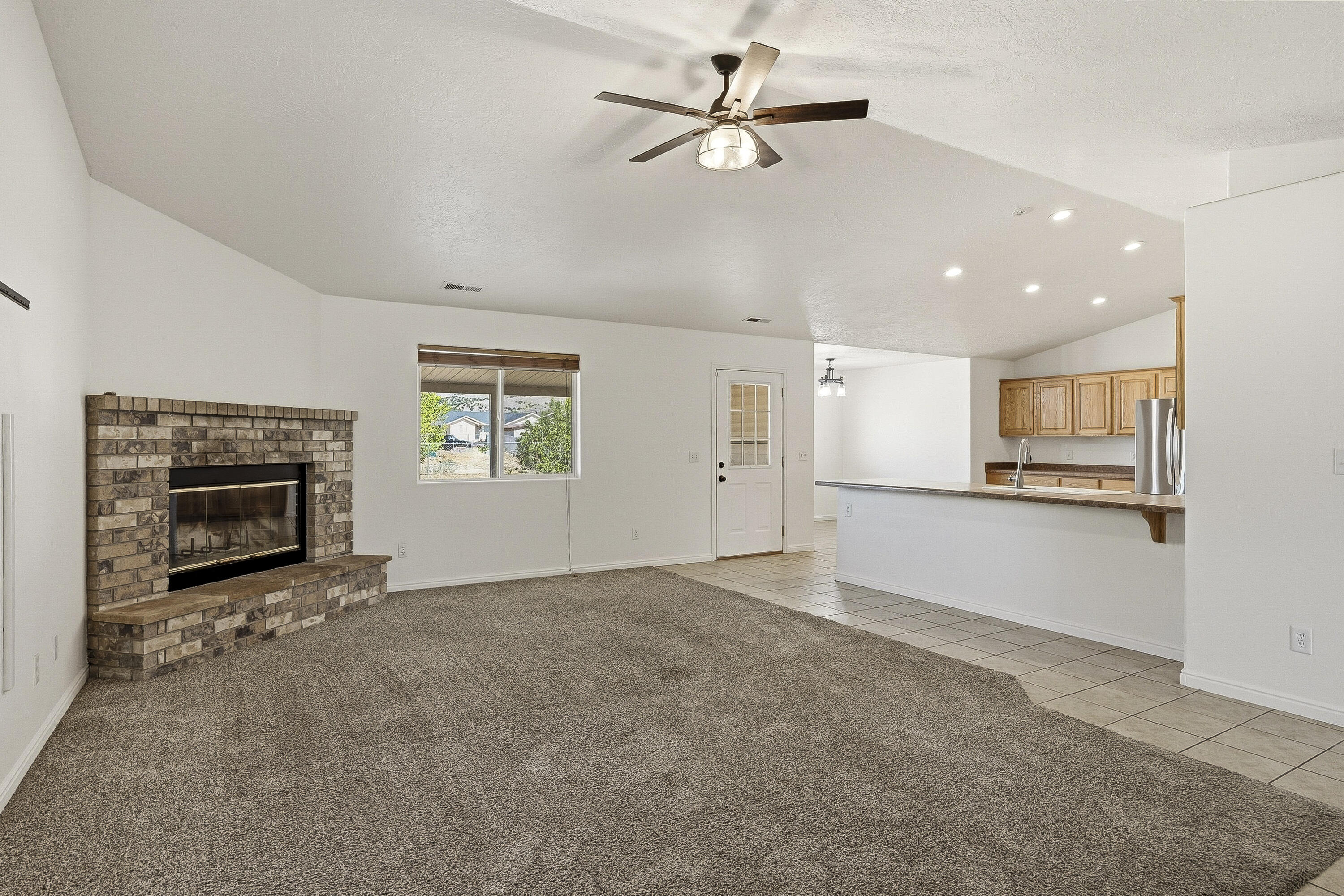 4510 North Half Mile Road Cedar City, UT 84721 - Photo 5 of 48 Just beyond the entry, you are welcomed into the open concept living/dining/kitchen space.