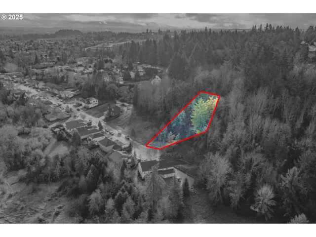 a aerial view of a house with a yard