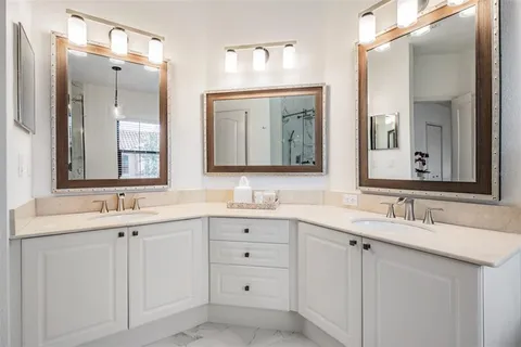 a terrace with chairs and a table