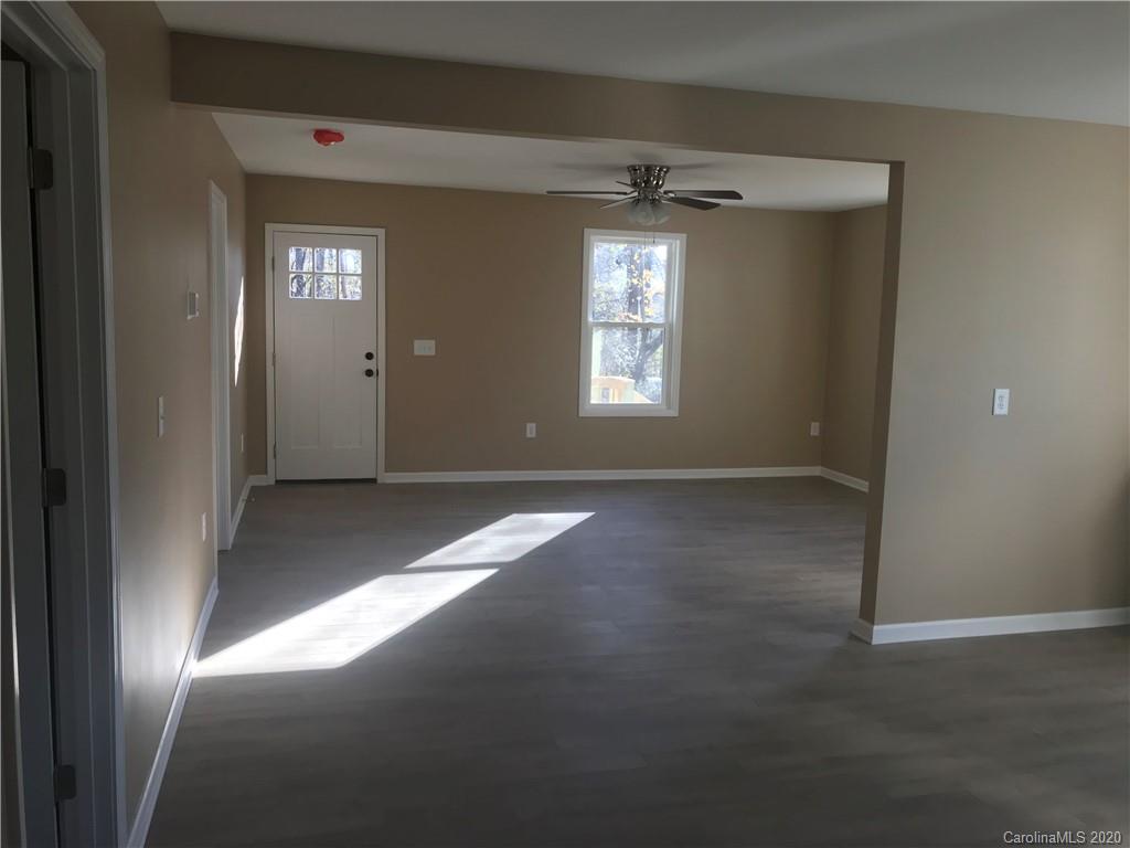 1507 Riley Street Albemarle, NC 28001 - Photo 18 of 26 a view of an empty room with a window