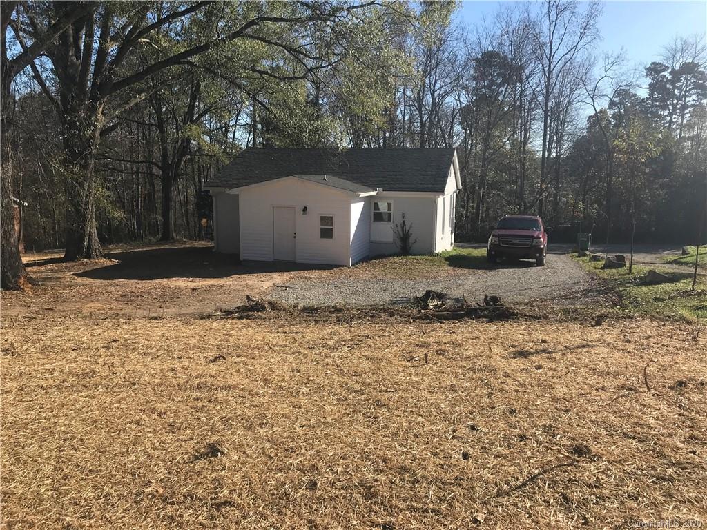 1507 Riley Street Albemarle, NC 28001 - Photo 26 of 26 a house that has a tree in front of it