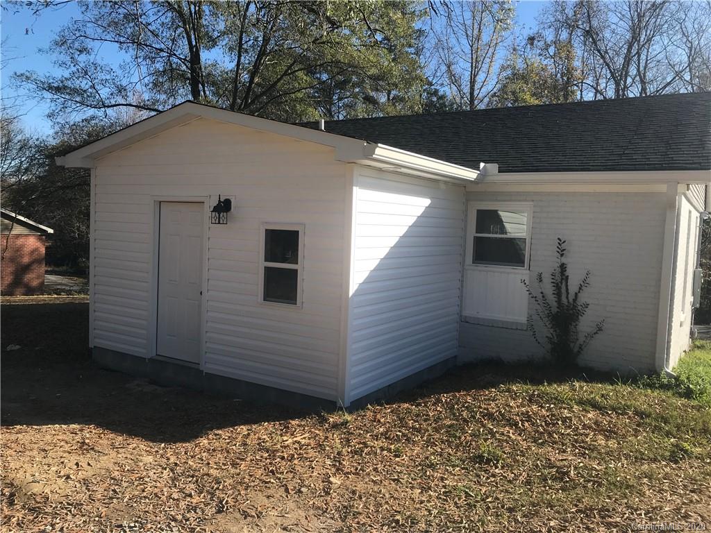 1507 Riley Street Albemarle, NC 28001 - Photo 5 of 26 a house view with a backyard
